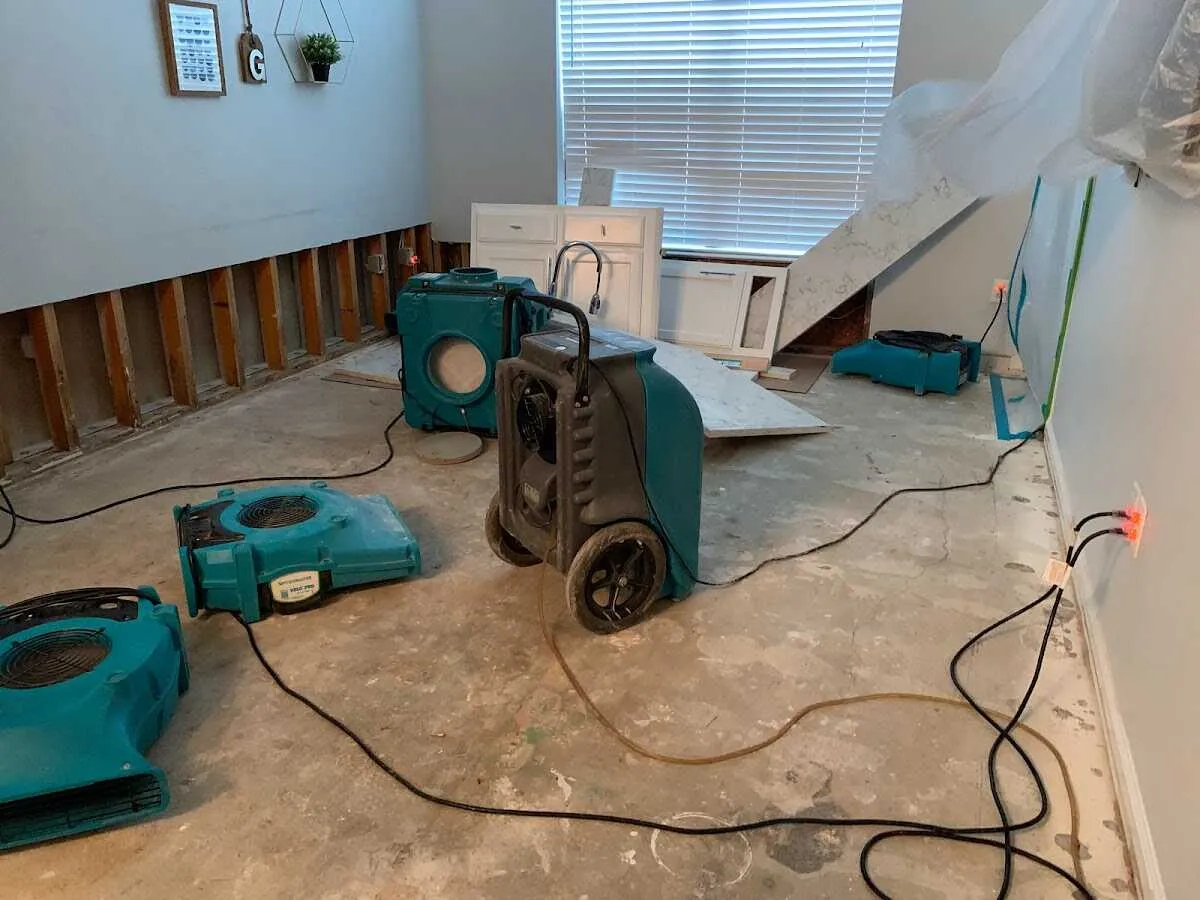 Dehumidifier in flood-cut room for Water Damage Restoration in Dorr