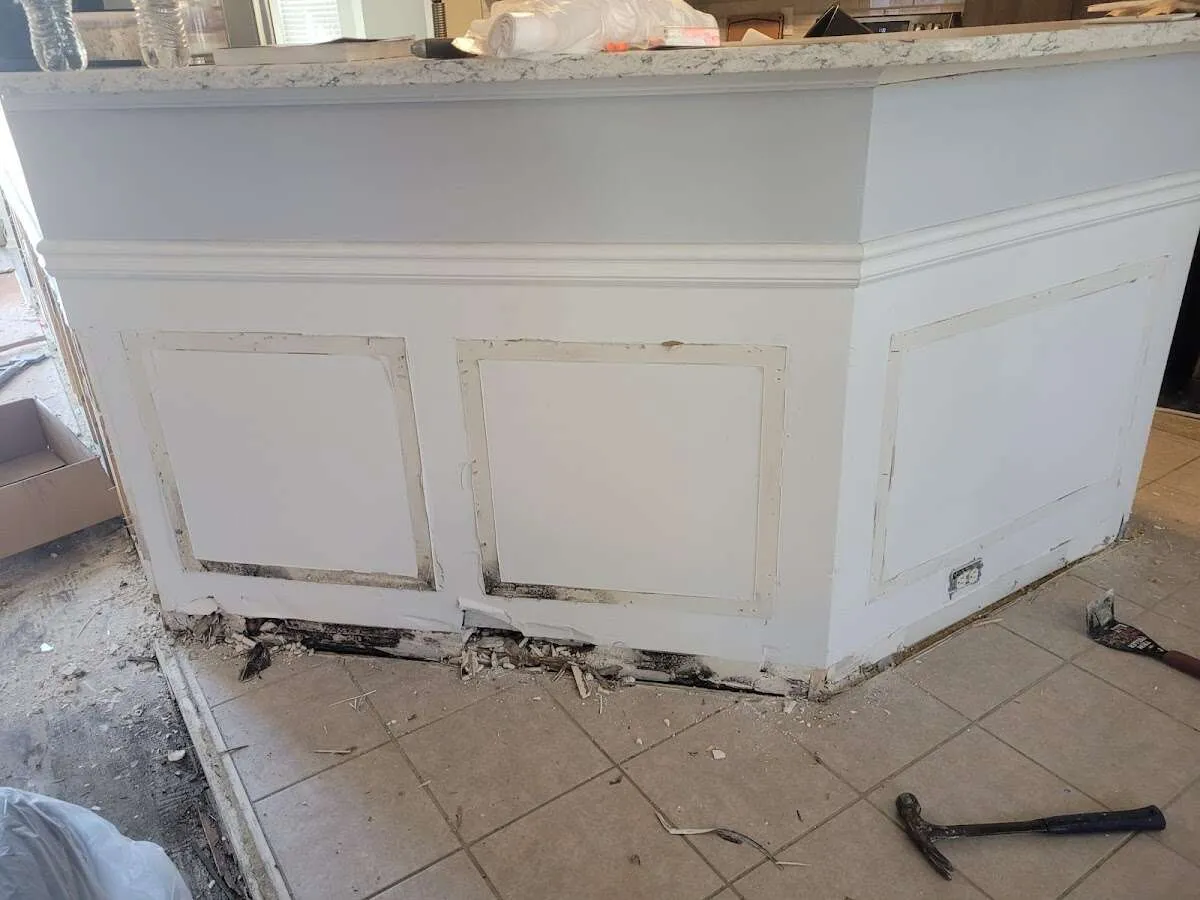 Water damage and mold on kitchen during Storm Damage Restoration in Dorr